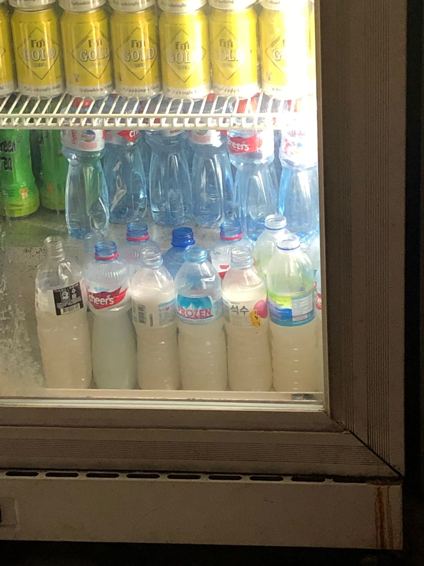 plastic bottles in the fridge containing a local drink in Kiribati