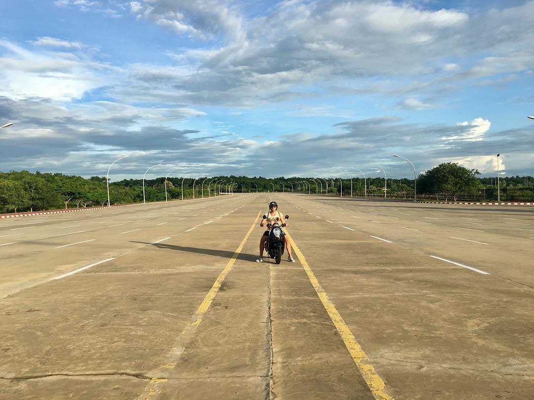 20 lane highway and me on a scooter in the middle of the empty street in Naypyidaw, capital of Myanmar