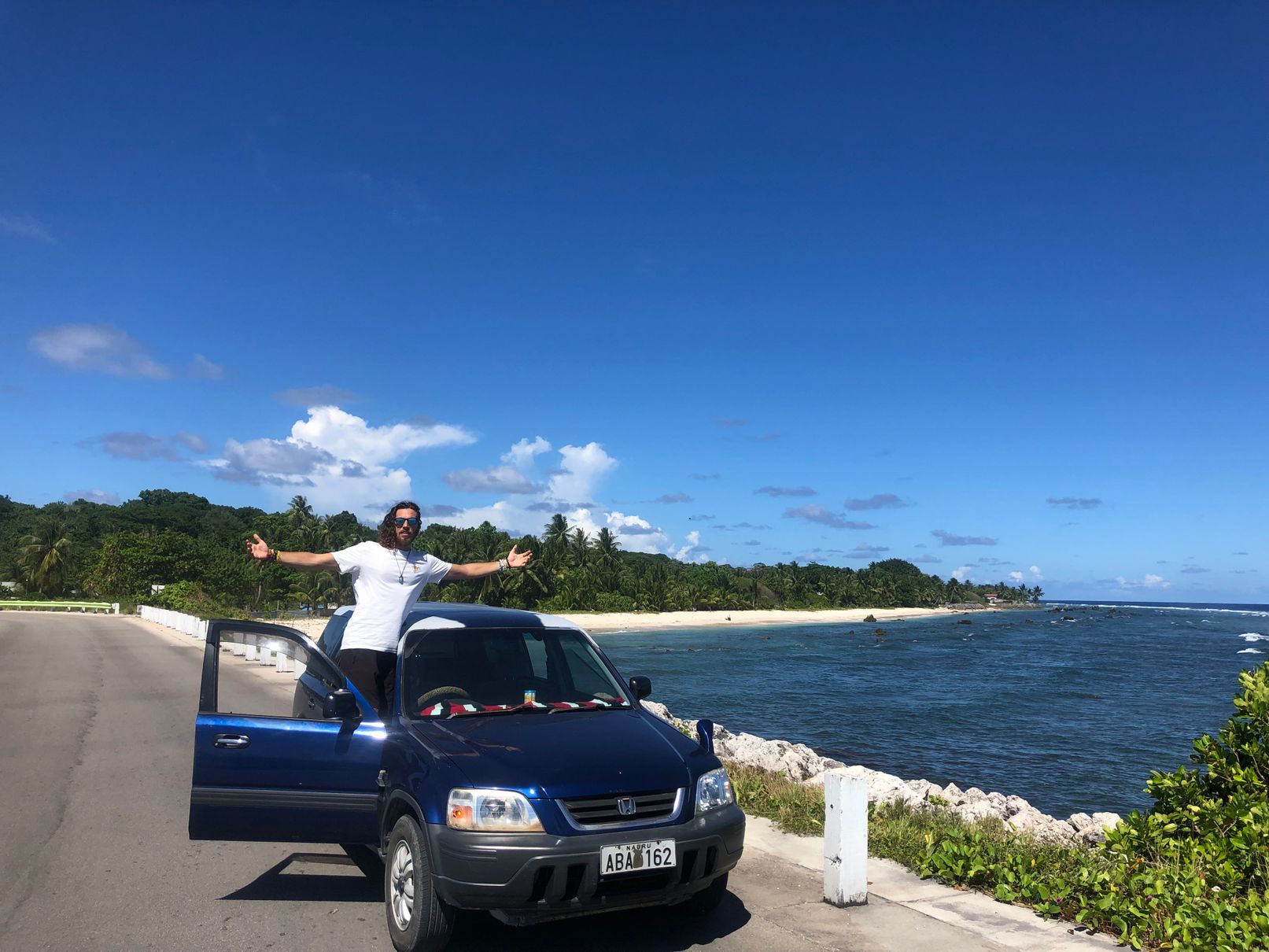 me on the car on the circular road in Nauru