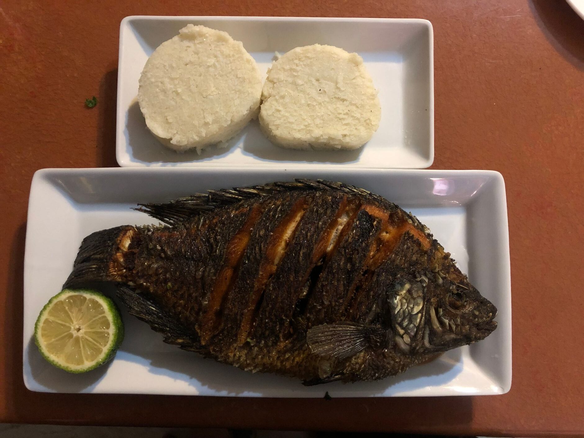 a dish of Tilapia with Ugali