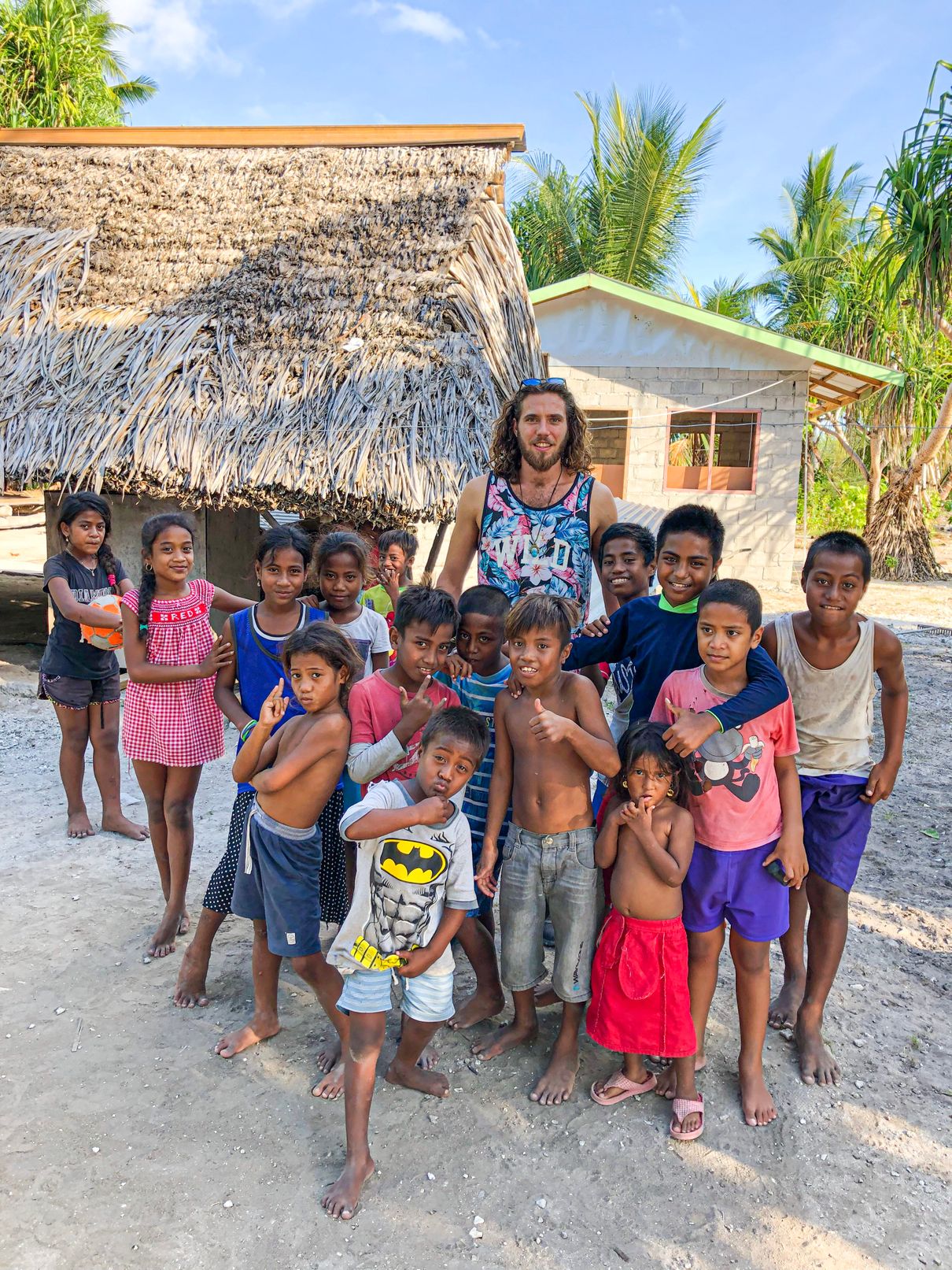 a group of kids at a local village in North tarawa