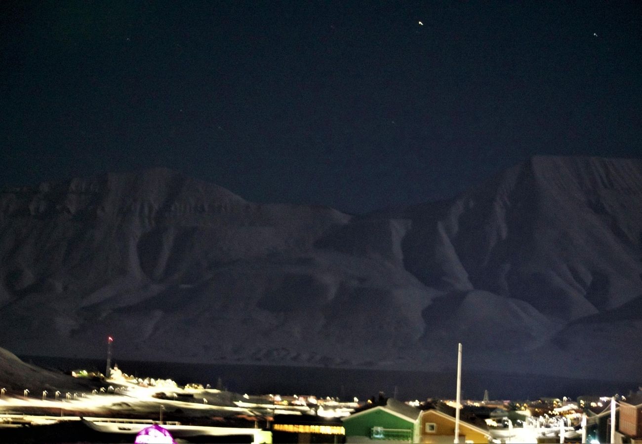 the view of the mountains from longyearbyen