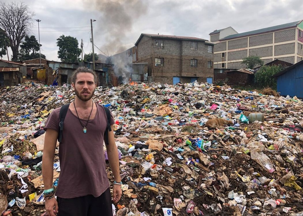 inside a rubbish dump in the middle of Kibera